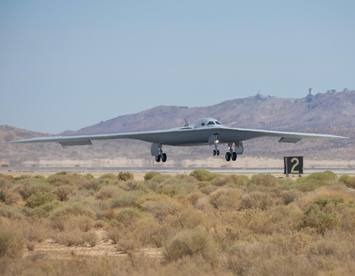 Air Force photo of B-21 landing on airstrip at Edwards Air Force Base