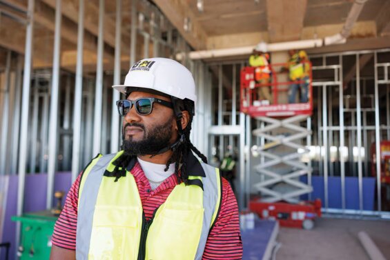 Florida Plumbing manufacturing manager wearing safety equipment.
